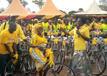 Minister Anite handing over bicycles to Women Council leaders