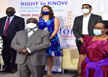 Oulanyah(Front Centre) with the Swedish Ambassador on his right and the State Minister for ICT on his left