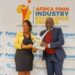 Uganda Commercial Director Isaac Sekasi and Vivienne Olenyo, Frontline Marketing Manager – Uganda, Coca-Cola East and Central Africa Franchise after receiving the award