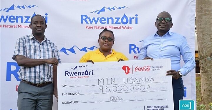 Innocent Obong, Quality Assurance Manager Rwenzori, Barbra Kiwanuka, Events & Sponsorship Manager at MTN and Isaac Ssekasi, Commercialization Director Coca-Cola Beverages Africa during the sponsorship handover at Namanve