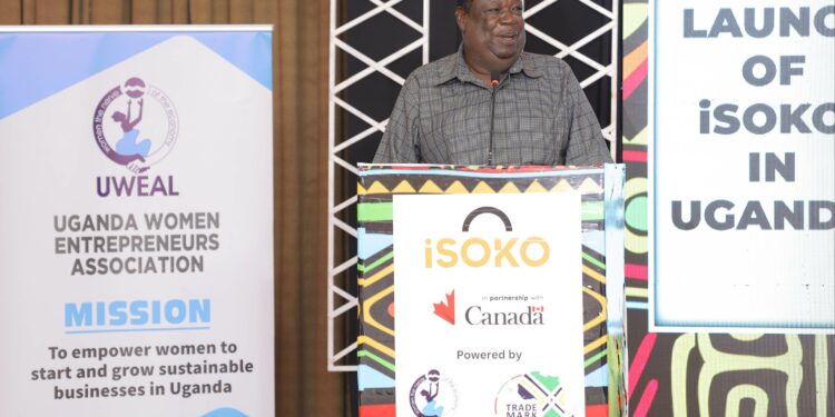 Hon. Magode Ikuya, State Minister for East African Affairs, Uganda at the official launch of the iSOKO trade platform at the Serena Hotel, Kampala. The platform will serve to bring together women traders from five countries in the East African Community — Kenya, Uganda, Tanzania, Rwanda and Burundi.