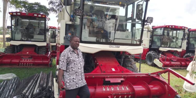 Mr Waya with some of the machinery donation from China at the district headquarters last week