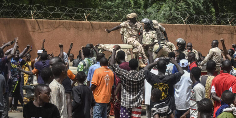 Masses join the mutinous soldiers to celebrate the ousting of President Mohamed Bazoum in Niamey,  Niger