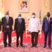 Mozambique’s High Commissioner to Uganda Jeromino Rosa Joao and his delegation (L) pose for a photo with Present Museveni after presenting his credentials at State House Entebbe on Tuesday. PPU Photo