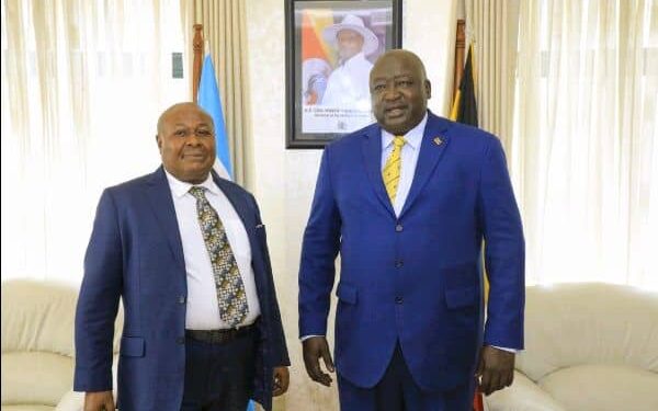 Godfrey Kirumira shares a photo moment with State Minister for Foreign affairs Okello Oryem after presenting his Credentials to him as new Honorary Consul for Namibia to Uganda at the Ministry of Foreign Affairs in Kampala recently