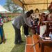 Tom Okao the Principal FIMAT greets and being blessed by the Lango Paramount Chief (Won Nyaci)Eng Dr Michael Moses Odongo Okune during a meeting on Friday 22 September, 2023 in Lira City.