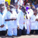 Dr. Samuel Oledo holding the microphone