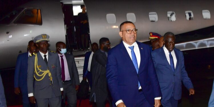 President Carlos Manuel of Sao Tome and Principe chats with ESO Director General Amb Joseph Ocwet on his arrival at Entebbe International Airport on Thursday morning. PPU Photo