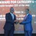 Julius Kakeeto the PostBank Uganda CEO receives the Award for Best People Focused CEO of the year 2023 during the recently concluded HR Reveal Awards at the Kampala Serena Hotel