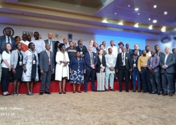 Prime minister and delegates in a group photo after the official closing on Thursday