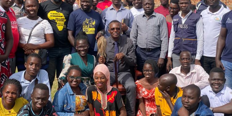 A section of journalists pose for a group photograph with the Paramount Chief-elect Eng Dr Michael Moses Odongo Okune after a cordial meeting on Sunday, 16 June 2024, at Senior Quarters in Lira City.