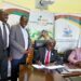 NARO Director General Dr. Yona Baguma (seated on left) and MeFarms' Managing Director Mr. Kule Brian signing the MoU in Entebbe in Tuesday