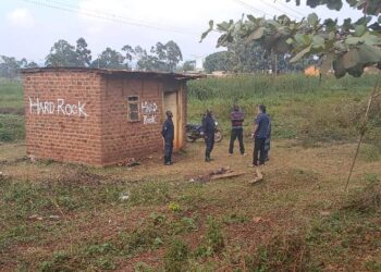 A section of private security guards from Wolves Security Group (U) Ltd who are physically guarding the land being briefed by Bob Singh Dhillion, the director Hard Rock Quarry Uganda Limited.