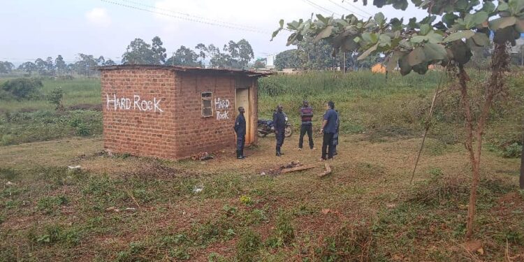 A section of private security guards from Wolves Security Group (U) Ltd who are physically guarding the land being briefed by Bob Singh Dhillion, the director Hard Rock Quarry Uganda Limited.