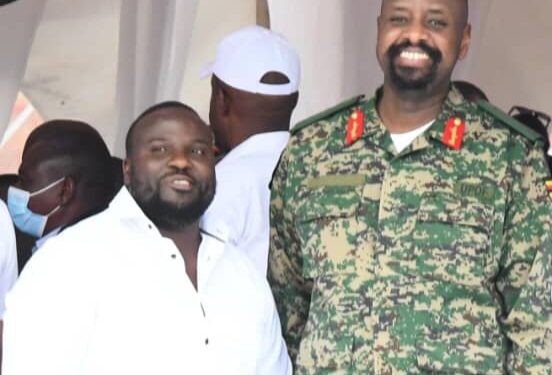 Emmanuel Joram Kamugisha (L) with CDF Gen. Kainerugaba Muhoozi