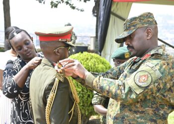 Gen Kainerugaba pipping newly promoted UPDF officers
