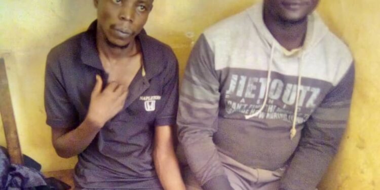 Waswa Morishid(L), a scrap dealer and a bodaboda rider(R)Wilber Mayanja in police custody over the incident.