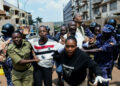 Ugandan police officers detain protestors during a rally against what the protesters say are rampant corruption and human rights abuses by the country's rulers in Kampala, Uganda July 23, 2024. REUTERS/Abubaker Lubowa