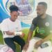 A Nurse in white t-shirt attached to Teamwork Homecare Services takes a Blood Pressure reading of a guest at a recent medical outreach. The firm specialises in management of chronic diseases like Hypertension and the provision of office, home based and emergency medical care to patients