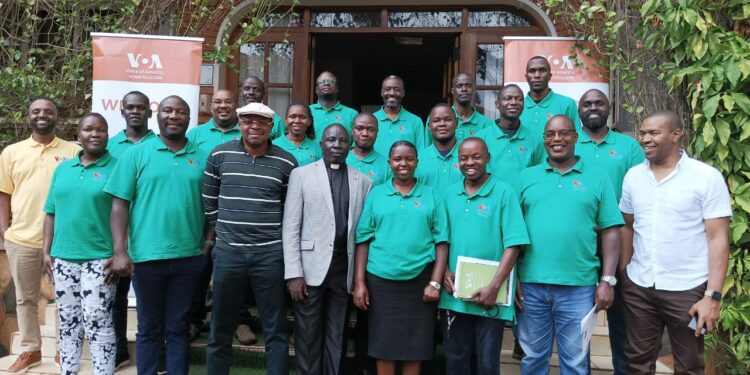 Group photo with journalists after a three day training on Artificial intelligence at Mosa Court Hotel and Apartments in Kampala.