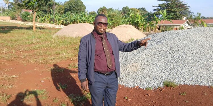 The Jinja Regional Referral Hospital chairman Management Board Dr David Charles Mukisa at the proposed Regional Blood Bank Site.