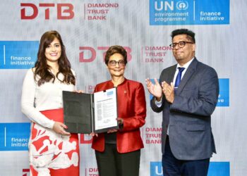 UNEP-FI's Nuran Atef (Left) with DTB's Nasim Devji (Centre) & Alkarim Jiwa (R) at the Signing Ceremony