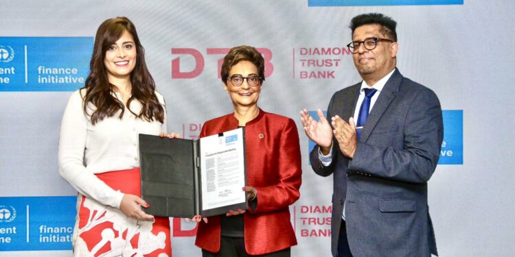 UNEP-FI's Nuran Atef (Left) with DTB's Nasim Devji (Centre) & Alkarim Jiwa (R) at the Signing Ceremony