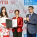 UNEP-FI's Nuran Atef (Left) with DTB's Nasim Devji (Centre) & Alkarim Jiwa (R) at the Signing Ceremony