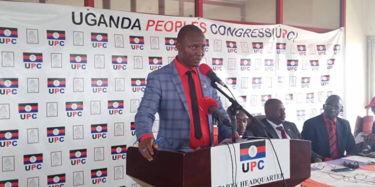 Mr. Dan Isimbwa, UPC National Youth Leader addressing Journalists at Uganda House on Wednesday