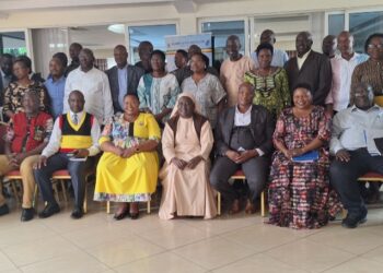 Minister Babalanda in a group photo with the workshop participants