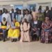 Minister Babalanda in a group photo with the workshop participants