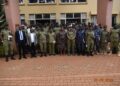 The Kiira Regional Police team with the chief SSP Charles Nsaba after a meeting in Jinja City.