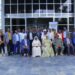 Hon. Babalanda in a group photo with the workshop participants