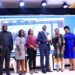 Andrew Kilonze Managing Director Uganda Breweries Limited (forth right) receiving an recognition award from Betty Among Minister of Gender, Labour and Social Development (Third right) during the for Gender Equality Seal Award Ceremony for private Sector companies at Serena Hotel on 8th December 2023. Photo by Ivan Kabuye.