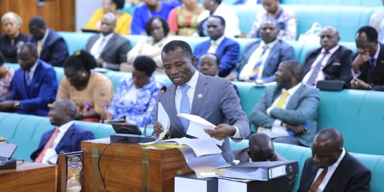 Committee Chairperson, Hon. James Kubeketerya presenting the report on the Bill