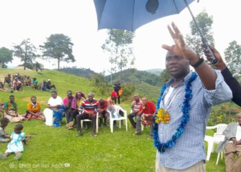 Boots on the Ground: State Minister of Finance Hon. Henry Musasizi, tours Parish Development Model (PDM) Gardens in Ishanga Village of Kagarama Ward, Hamuhambo TC, Rubanda District.