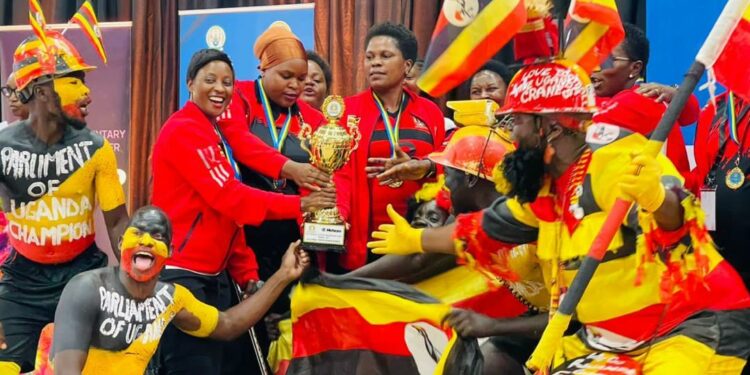 All eyes and energy for Uganda Parliamentary Women Volleyball team players led by Hon. Helen Nakimuli (Left on the red sports wear) are on defending the title starting from their maiden game against hosts Kenya on Sunday.