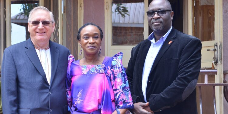 Keith Collyer Ssali, Janet’s husband, Janet Edith Nkabidwa Collyer and Owek Robert Waggwa Nsibirwa, the second deputy Katikkiro.