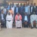 Haji Kakande in a group photo with officials from the Office of the President,RDCs ,DISOs and RISOs