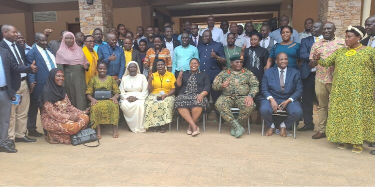 Hon. Babalanda, Col. Katabazi with officials from the Office of the President and other workshop participants