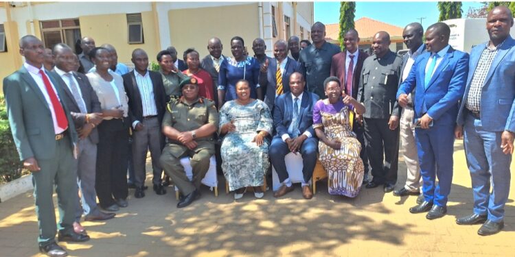 Hon. Babalanda,Col. Emmy Katabazi in a group photo with the workshop participants