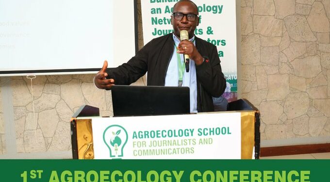 Dr. Ivan Lukanda presenting during the first Agroecology Conference at Hotel Africana, Kampala.