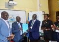 NARO-Director-General-Dr.-Yona-Baguma-and-the-Vice-Chancellor-Busitema-University-Prof.-Waako-exchange-MoUs-after-signing.-Courstesy-photo.jpg