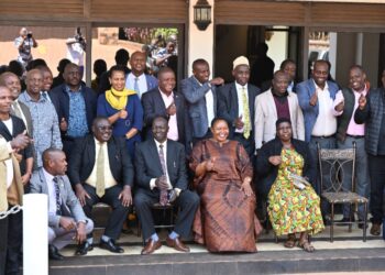 Hon. Babalanda in a group photo with the workshop participants