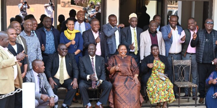 Hon. Babalanda in a group photo with the workshop participants