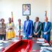 Hon. Eng. Hilary Onek (center), Ambassador Robie Kakonge (left), and UNHCR Country Representative Mr. Mathew Grentsil (right) pose for a photo.