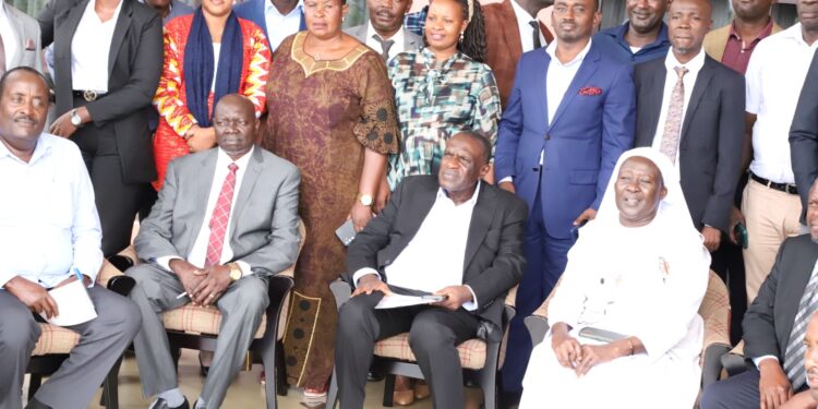 Hajji Kakande in a group photo with the workshop participants