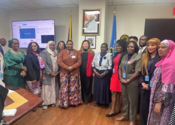 Hon. Babalanda in a group photo with other event attendees